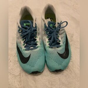 Like new women’s size 7 Nike White and blue  Athletic Shoes